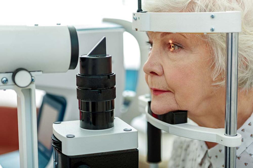 Women getting her eyes checked.