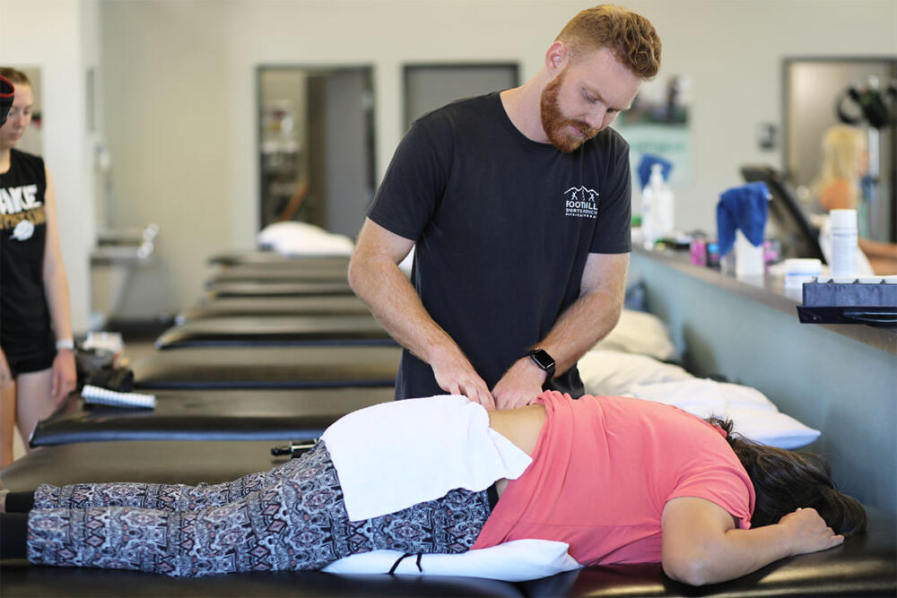 Woman suffering from chronic pain in the back. 