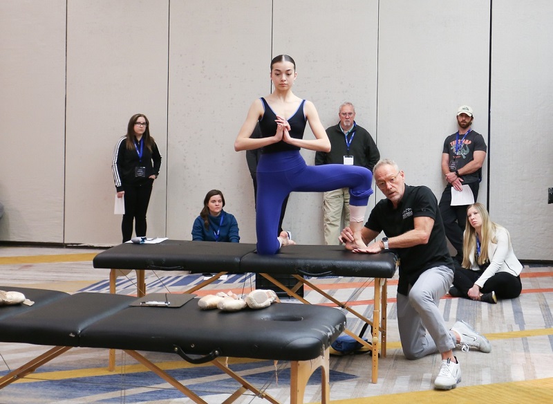 Ballet dancer being evaluated by a physical therapist.