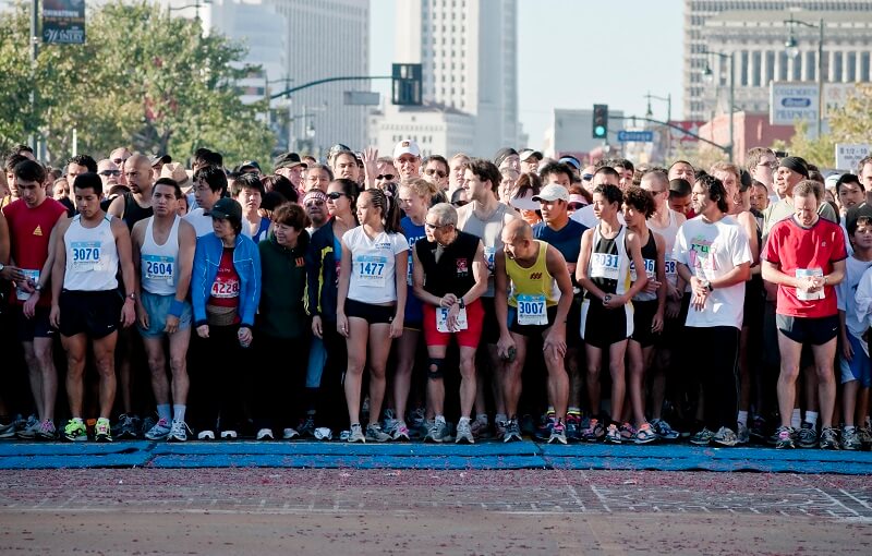 Marathon runners at starting line.