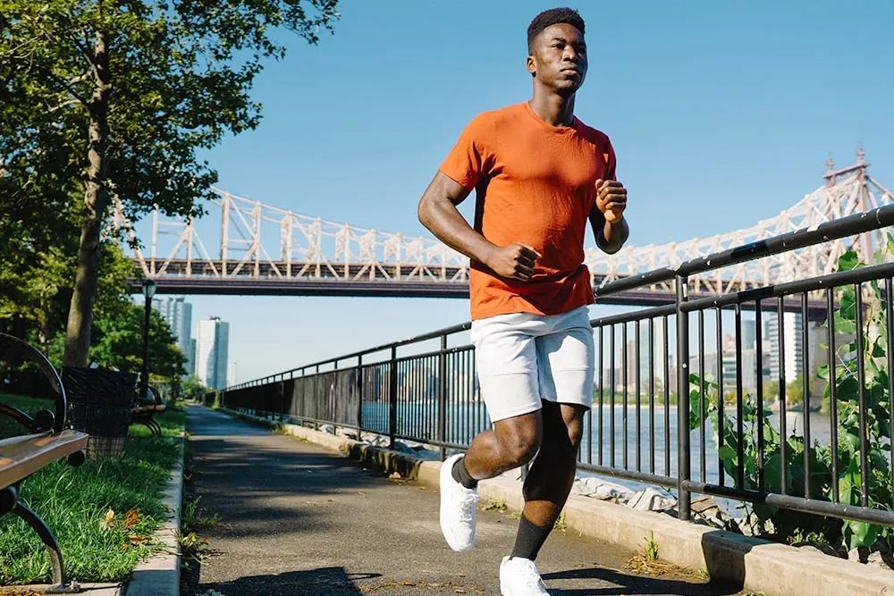 Man jogging in park.
