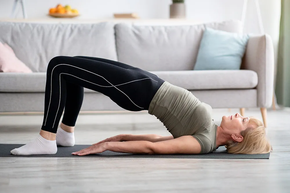 woman exercising her kegels to strengthen her core.