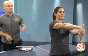 Woman stretching her arm.