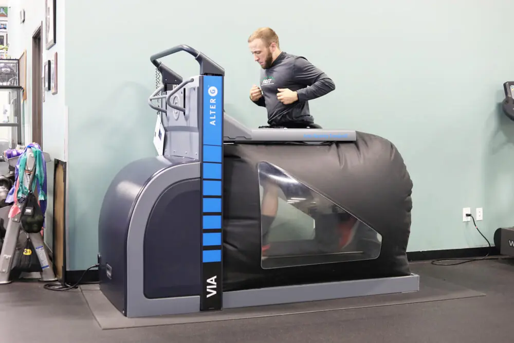 Athlete running on AlterG.