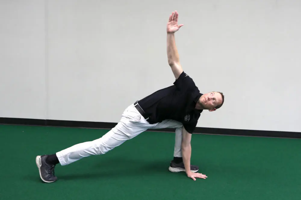 Athletic trainers stretching in the gym